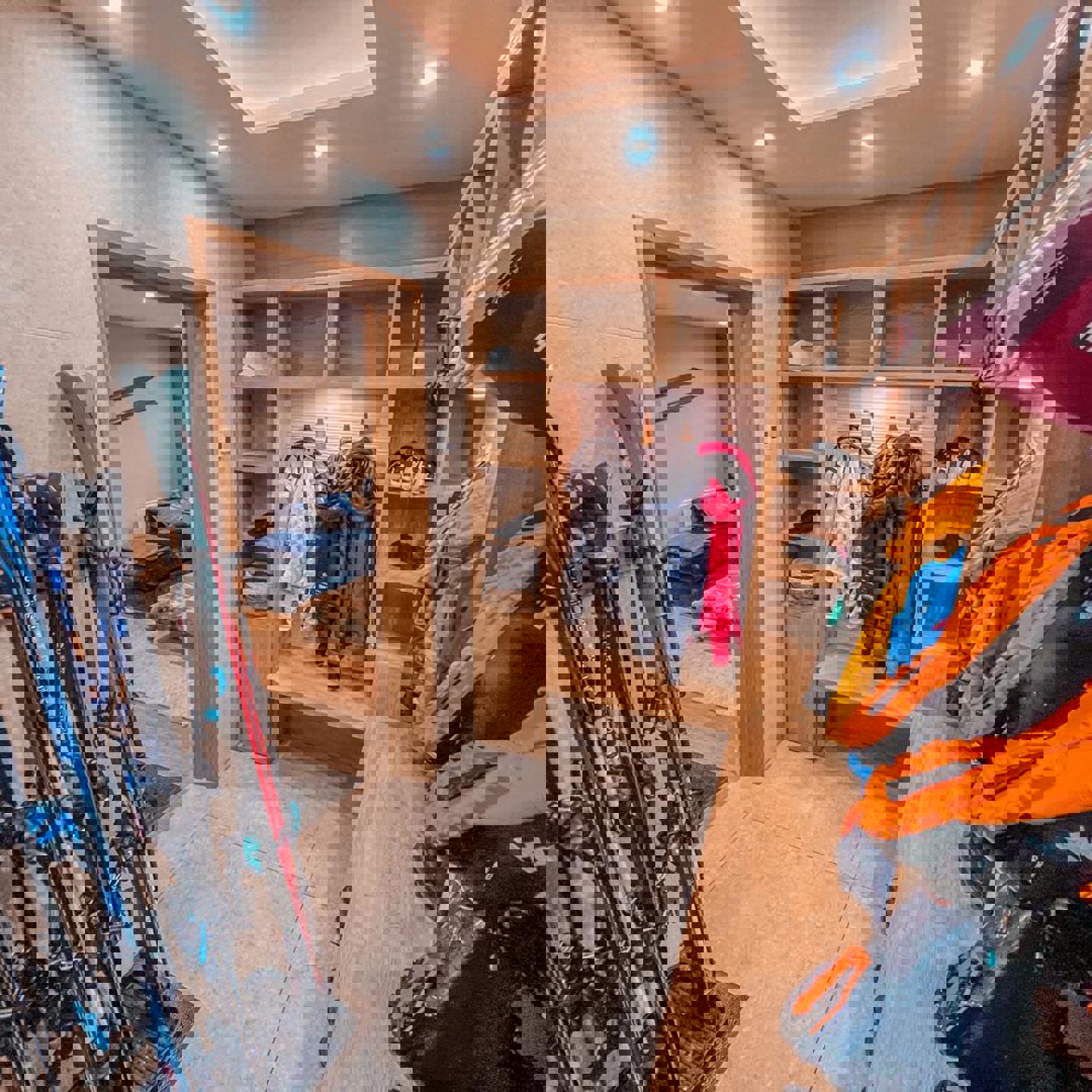 QM ski room with entrance to TV room